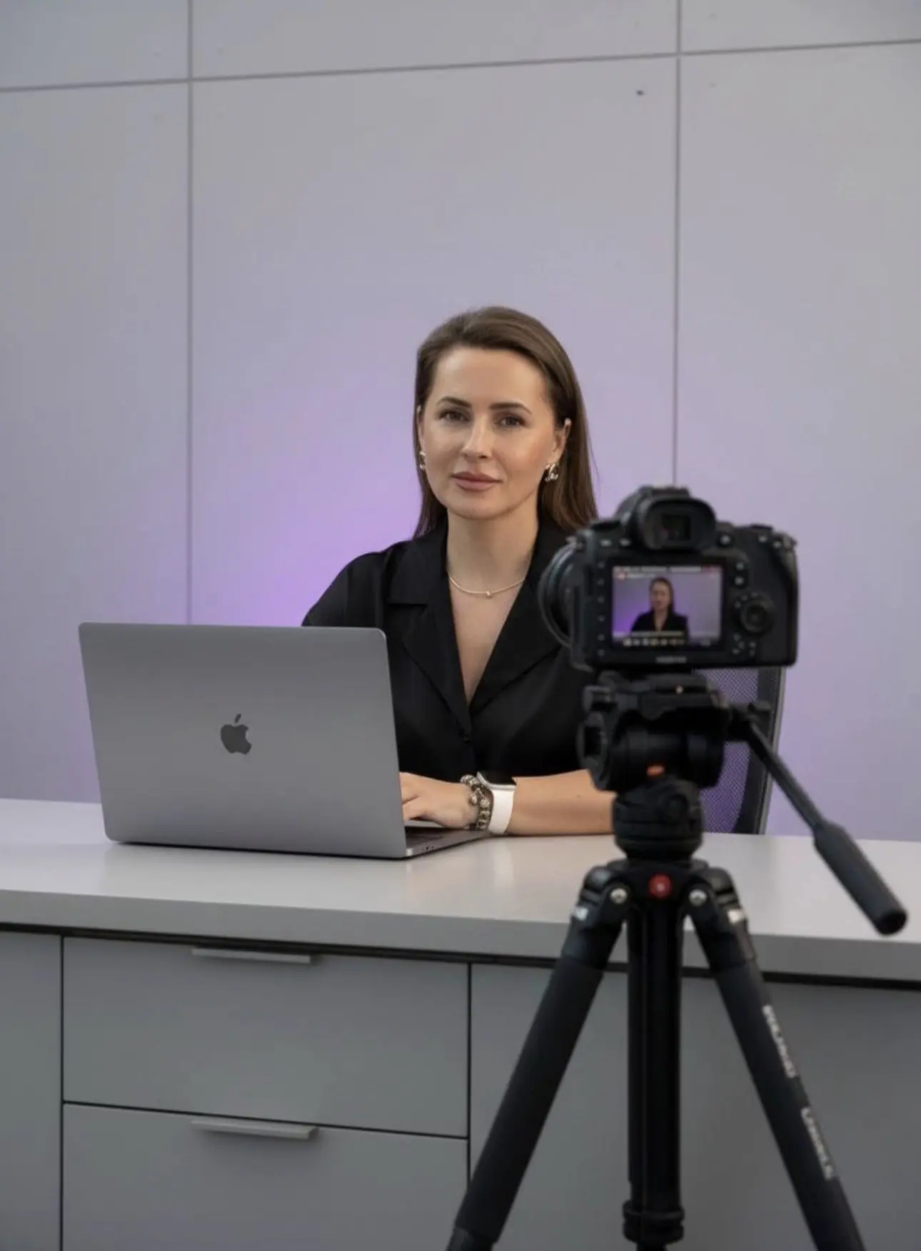 Irina recording an online nail education lesson